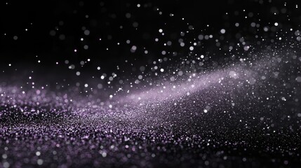 Obraz premium A mesmerizing display of shimmering particles against a dark background, creating a dreamy effect.