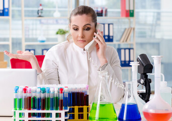 Female chemist working in medical lab