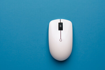 Computer with mouse in blue on . business design hand concept. wireless mouse in blue and white on a white . a computer with a mouse in white and lifestyle blue on a.