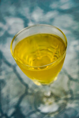 Glass of white wine on a table without people