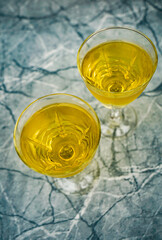 Glass of white wine on a table without people