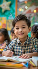 Fototapeta premium Portrait of Asian Boy Student Smiling in Classroom