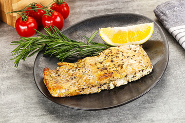 Baked salmon fish served rosemary