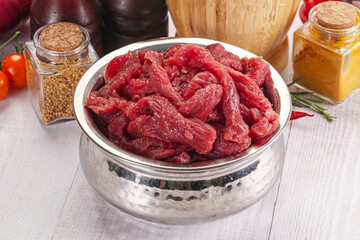 Raw beef meat - sliced strips