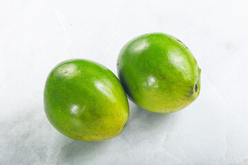 Two ripe green exotic avocado fruit