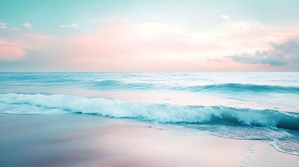 Obraz premium A picturesque coastline with waves gently lapping against the shore under a pastel sky