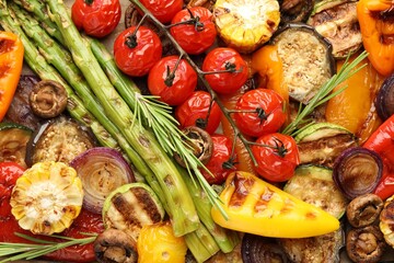 Delicious grilled vegetables on table, flat lay