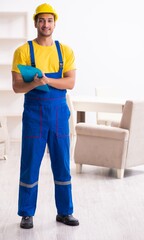 Young male contractor in relocation concept