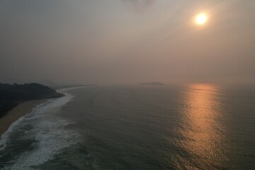 Fototapeta premium Somke sunrise at Brazil due rainforest fires. 