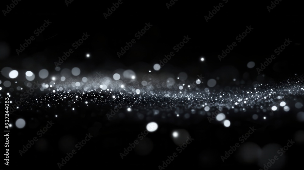 Poster a shimmering display of sparkling particles against a dark background.