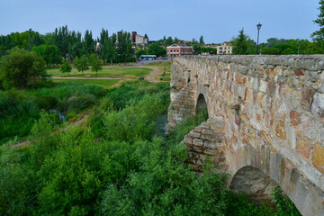 Fototapeta premium The ancient Roman bridge in Salamanca, historic city in Spain.