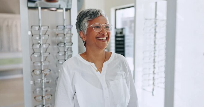 Glasses, shopping and senior woman smile with check and optometrist with eye test. Decision, customer and store with prescription eyewear and lens with frame choice and smile at a retail shop