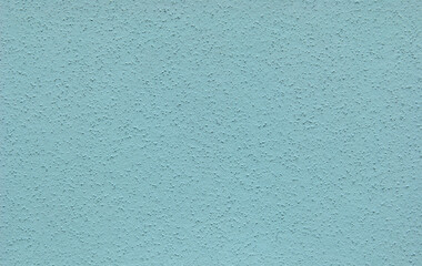 Blue plastered wall background, plastered texture