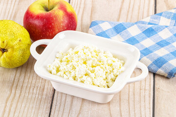 Organic cottage cheese in the bowl