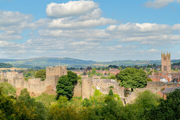 Fototapeta premium Ludlow town in Shropshire, UK on a Summer day from an elevated position with Castle and Church