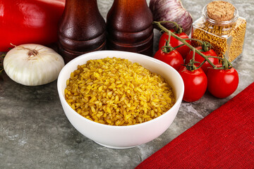 Dry wheat bulgur cereal heap