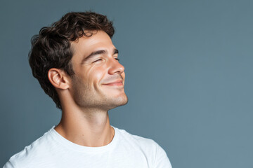 Fototapeta premium A close up of a man's face with her eyes closed