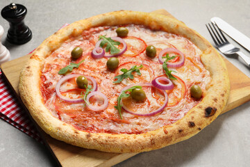 Delicious vegetarian pizza on light grey background, closeup