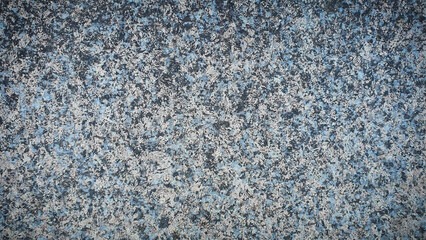 A detailed 4K texture background featuring a speckled granite-like pattern with shades of blue, gray, and black. Ideal for architectural designs, backgrounds, and material studies