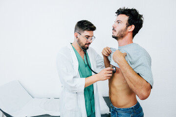 Doctor Using Stethoscope in Patient Check-Up