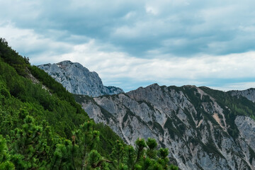 Panoramic view of majestic mountain peak Luserwand in Schladming, Schladminger Tauern, Styria, Austria. Hiking trail in Austrian Alps in spring. Remote alpine landscape. Wanderlust. Snow capped ridges