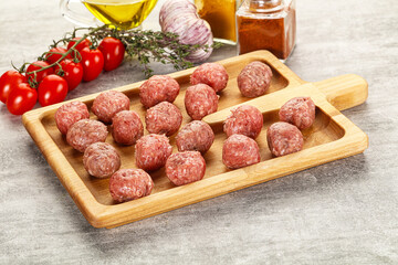 Uncooked raw beef meatball minced