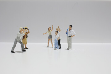 Miniature people family concept with white background