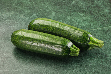 Raw green ripe zucchini vegetable