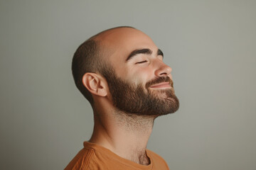 Obraz premium A close up of a man's face with her eyes closed