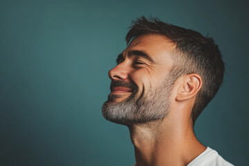 Fototapeta premium A close up of a man's face with her eyes closed