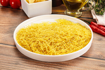 Raw dry Italian pasta Vermicelli