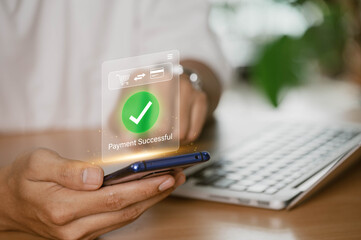 Shopping and online payment concept. person holding a smartphone with a digital confirmation of a...