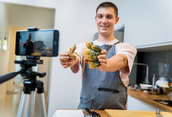 The chef is broadcasting live from workshop how to prepare a vegetarian food