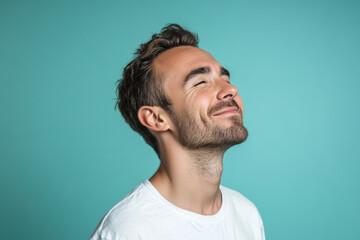 Fototapeta premium A close up of a man's face with her eyes closed