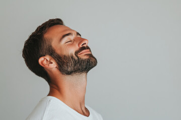 Obraz premium A close up of a man's face with her eyes closed