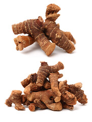Dried galangal root isolated on white background
