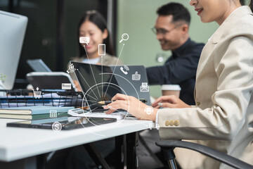 Business team working on a project in the office or reviewing and discussing a business project.