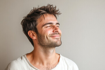 Fototapeta premium A close up of a man's face with her eyes closed