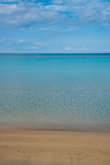 Empty sandy tropical exotic beach with with golden sand.