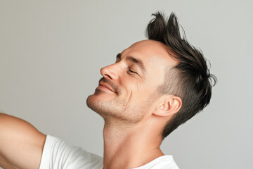 Fototapeta premium A close up of a man's face with her eyes closed