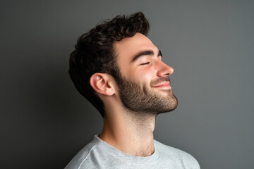 Obraz premium A close up of a man's face with her eyes closed