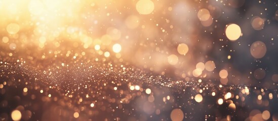Naklejka premium close up of a sparkling surface with a warm, golden glow glitter backgrounds