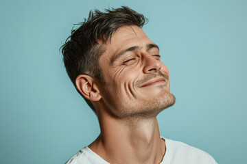 Fototapeta premium A close up of a man's face with her eyes closed