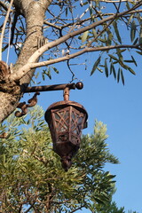 Hanging lamps on the main roads have classic shapes and beautify the ornaments on the streets