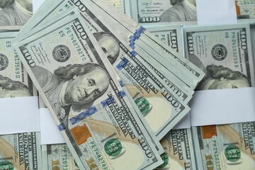 Fototapeta premium Many dollar banknotes as background, top view