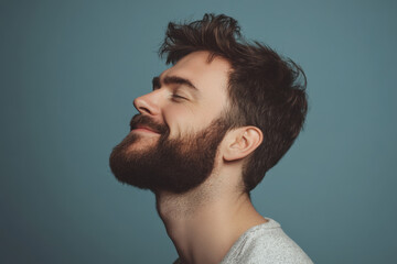 Fototapeta premium A close up of a man's face with her eyes closed