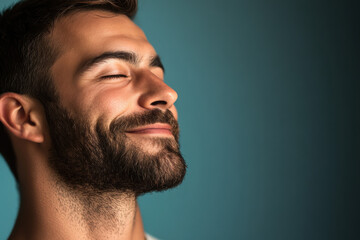 Fototapeta premium A close up of a man's face with her eyes closed