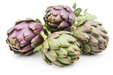 Fototapeta premium Artfully arranged fresh artichokes on a white background