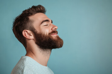 Obraz premium A close up of a man's face with her eyes closed