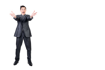 Amazed man celebrating success in studio. White background.